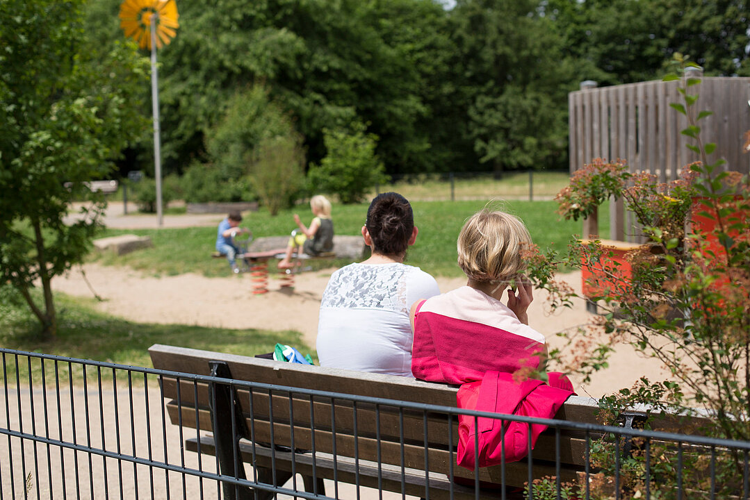 Mothers with their children in the playground